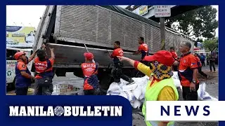 1 dead, 2 hurt as truck hits traffic light post in QC