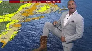 FOX 5 meteorologist Mike Woods shows off cowboy boots