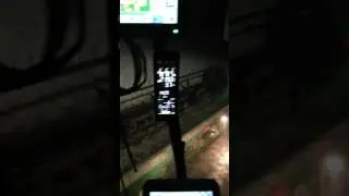 John Deere s670 with 40 foot Draper head at night