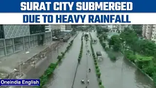 Gujarat: Surat city submerged under water due to heavy rainfall, Watch | Oneindia News *News