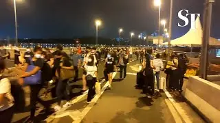 People walking towards Woodlands Checkpoint on March 31 | Singapore-Malaysia border reopens