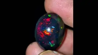 Amazing dry Ethiopian black Flashy fire opal cabochon Rainbow fire opal cabochon bigger size.