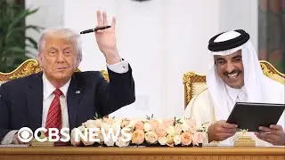 Trump meets with Qatar's emir, signs defense agreement