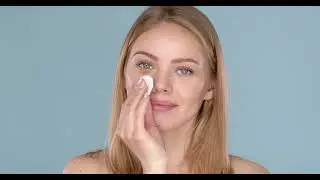 skin care concept woman removing face makeup with  W7QZVSF