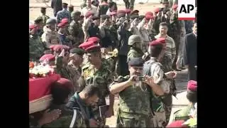 Iraq and Iran swap remains of war dead from eight year war