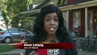 Volunteers clean up trash piled up outside Charlotte home