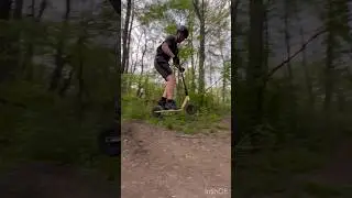 Hitting an abandoned MTB jump on a dirt scooter #scooter #jump #mtb