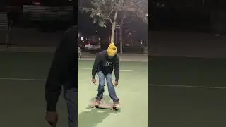 Skating at a basketball court