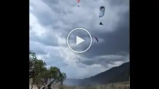 A strong storm blows paragliders into the air #gleitschirm #paragliding