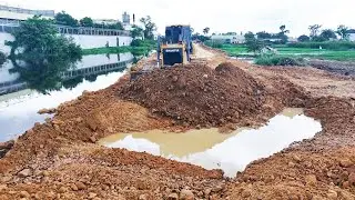Road Construction Complete: SHANTUI Dozer Finishes Grading with Truck Support