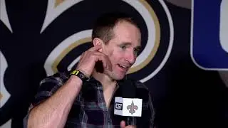 Drew Brees with Mike Nabors & Deuce McAllister after Saints' 31-17 win vs. Falcons