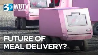 Little robots are rolling around Charlotte sidewalks delivering coffee