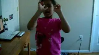 Iyana Barnes dancing+ singing to Melville Dewey..