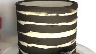 Black and white buttercream stripes with upside down drip