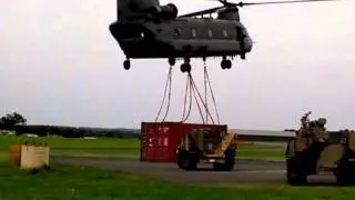 Chinook lifting an iso containor