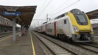 NMBS M7 stam 76007 vertrekt van station Tournai