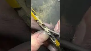Carving pencil into 3 prong chain link with Dremel #art