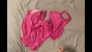 Ripping up a shiny pink nylon Adidas jacket