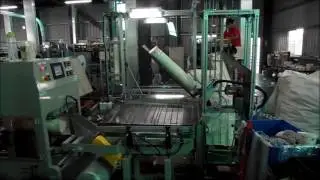 Alpha Vac inline cup packer