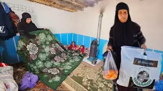 Buying a blanket. The happiness of a woman and two children