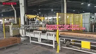 Industrial Palletizing Robot Working on Cardboard Box Packaging Line with Sealing & Strapping