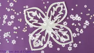 The snowflake is cut out of paper with your own hands