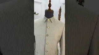 The beige striped Safari suit &mdash; where class meets craftsmanship. WhatsApp +2348152299036 to order