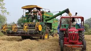 John Deere harvester stuck in mud || Tractor stuck in mud || Rice cutting machine ||