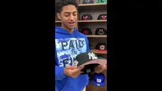Бейсболка New Era 59Fifty Fitted Hat, посвященная 100-летию команды New York Yankees (черная с розовой внутренней стороной козырька).