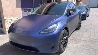Tesla Model Y long range deep blue with Stealth PPF and ceramic tint. Smoked headlights.