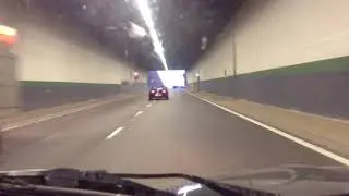 Vw beetle driving through a tunnel