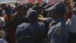 Scuffles break out in South African protests against Obama's visit
