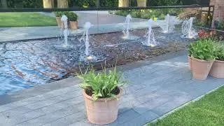 Reflection pool with fountains and lighting