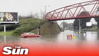 Britain hit by flash flooding as showers lash down causing havoc on roads