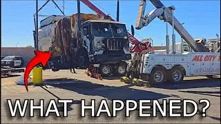 Massive Tow Trucks Haul Away Severely Burned Garbage Truck