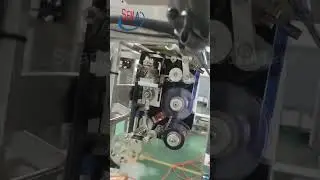 A 4 side sealing powder sachet packing machine with conveyor belt
