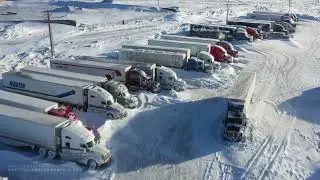 02-23-2023 Rawlins, WY - Blizzard Aftermath-Semis Buried in Snow-i80 Still Closed *Drone*
