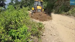 Hilly Road Ruts During Rainy Season-Backhoe Loader-Filling Ruts