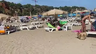 Cala Llenya summer beach walk
