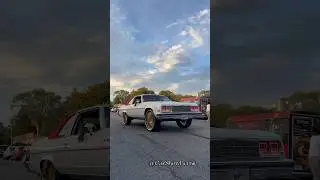 White Buick Electra 225 on gold Savini Wheels arriving at the MidwestFest 7 finale at Stunt Sunday