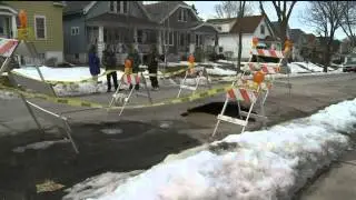 Did hole in road damage a car?