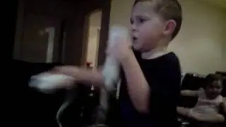 angry kid playing wii