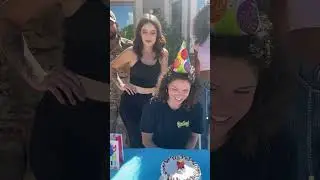 Military husband surprises his wife by taking picture next to her and she didn't even noticed him