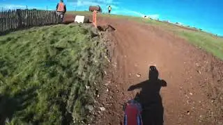 Archie riding his ktm sx 65 at north Devon motocross track. 