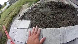 Pose de pavés en arrondi et cacher un puisard sous les pavés