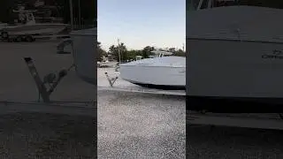 Sleek teak boat! Great hull design