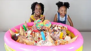 EATING A POOL FULL OF THE WORLD'S LARGEST ICE CREAM SUNDAE!!