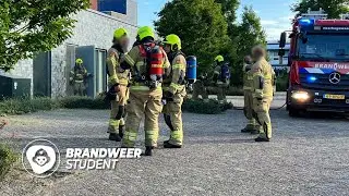 MENSEN VAST IN BRANDEND APPARTEMENTENCOMPLEX