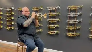 Carlos Garza in the Bell Trumpets showroom