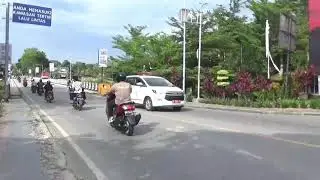 walking around the city of Poso Indonesia